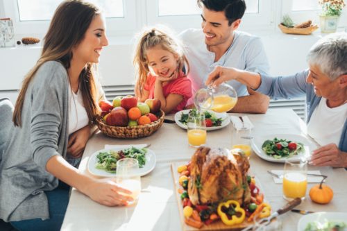 Three generation family having a Thanksgiving dinner.